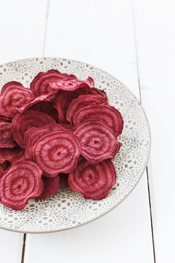 A plate of beetroot crisps