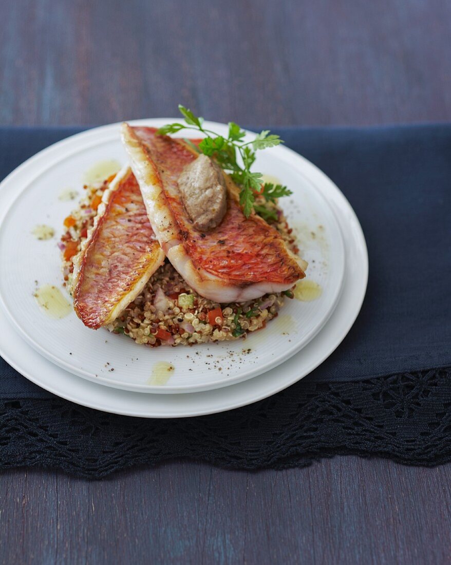 Red mullet on a bed of quinoa