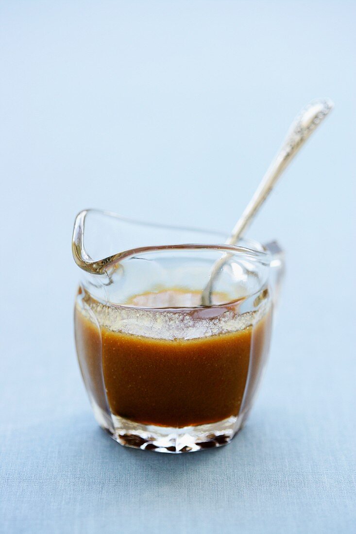 Butterscotch sauce in a glass jug