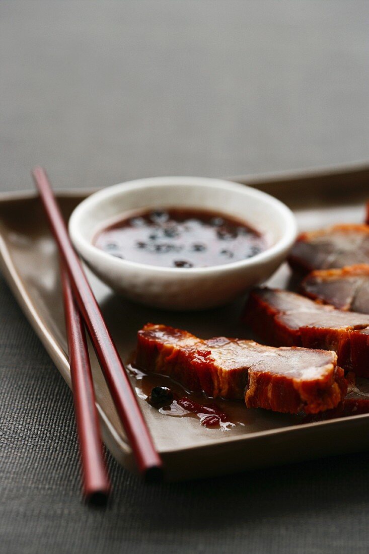 Grilled pork with plum sauce (China)