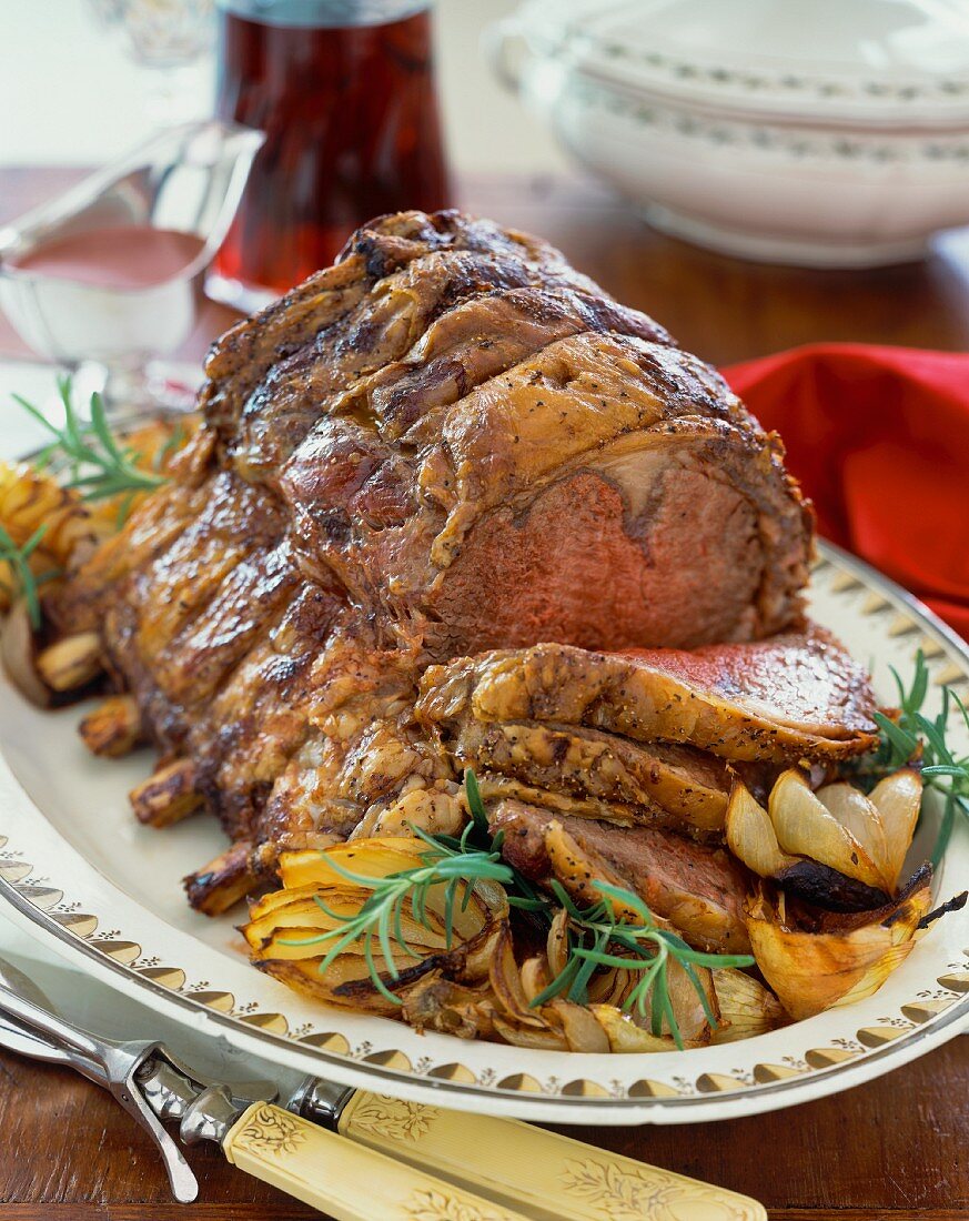Rack of beef with rosemary and onions