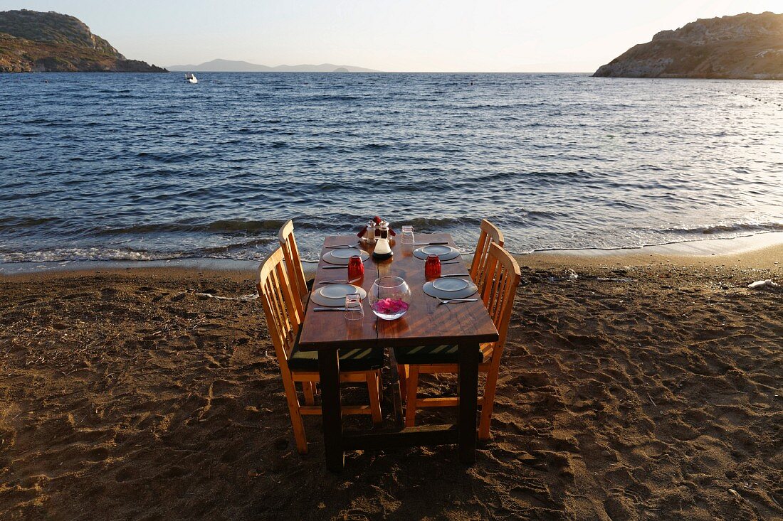 A table laid on a beach (Turkey)