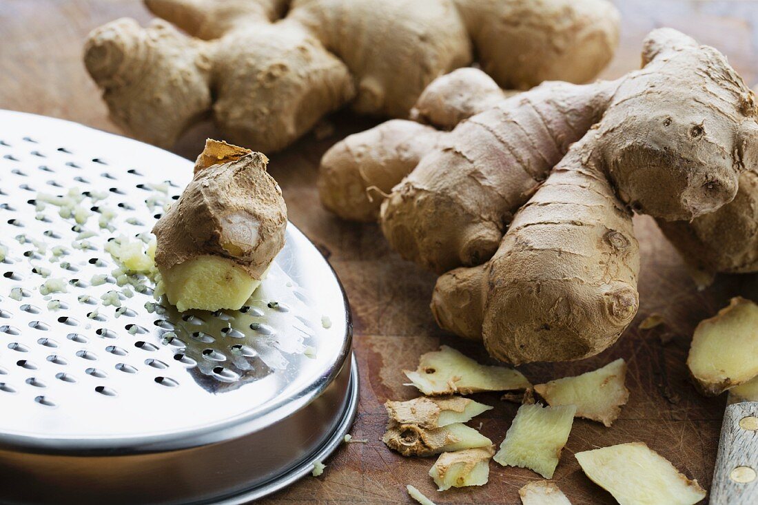 Fresh ginger with a grater
