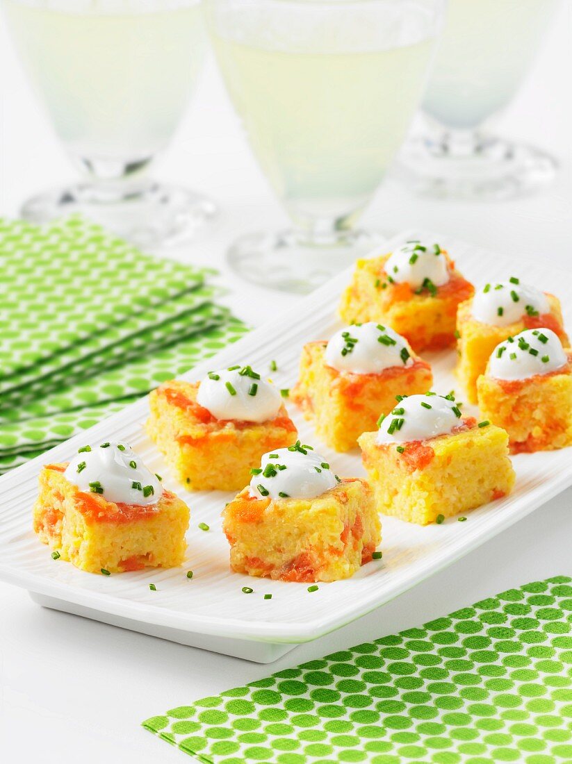 Corn cake squares with smoked salmon and chive cream