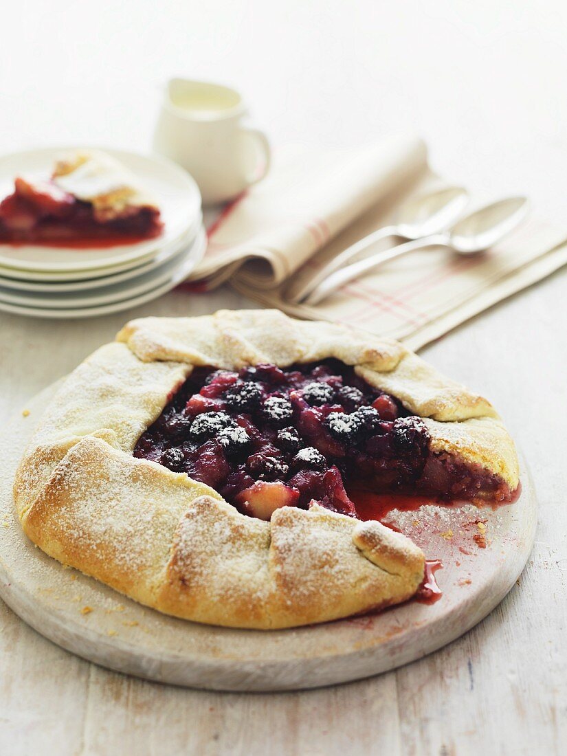 Fruit tart with berries and apples