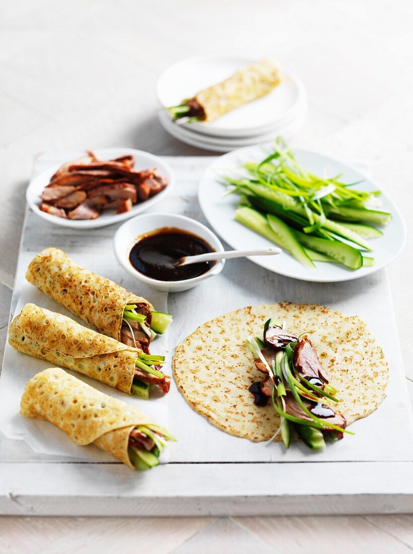 Crêpe wraps filled with Peking duck and cucumber