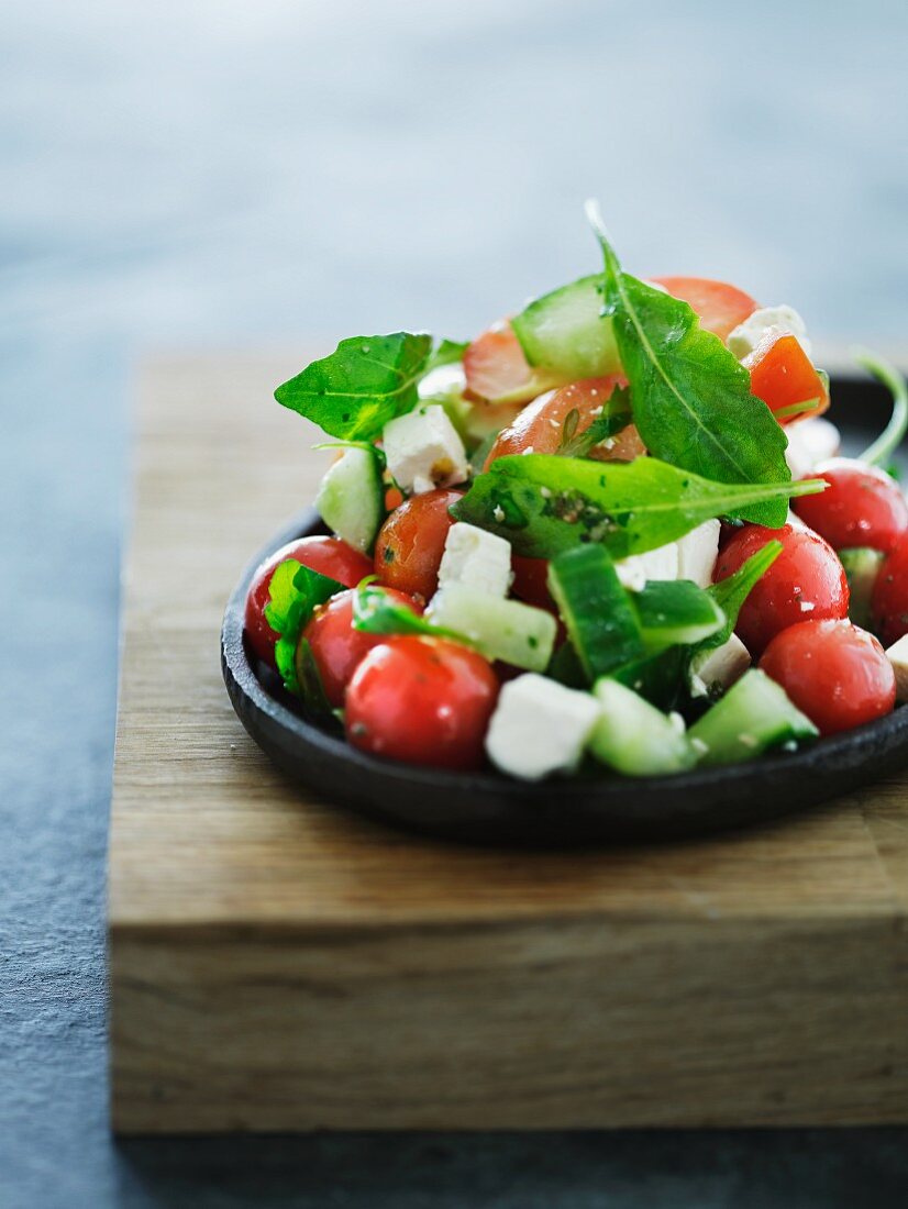 A colourful vegetable salad with feta cheese
