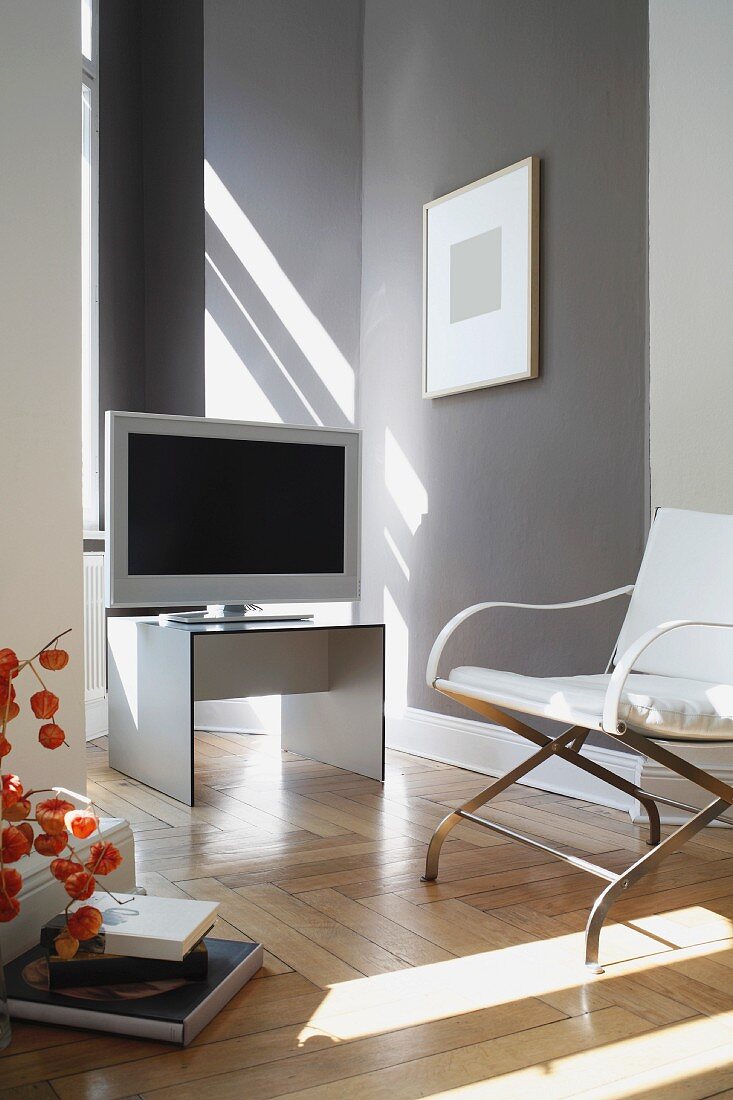 Television and armchair in a modern living room