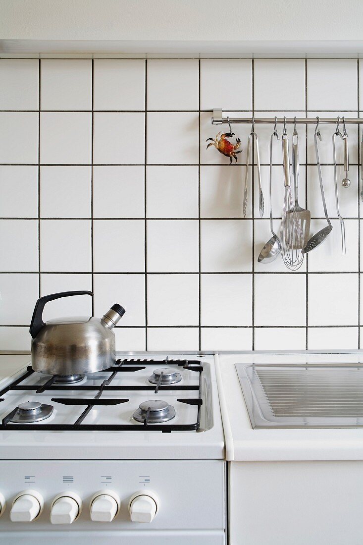 Detail of stove and sink in a kitchen