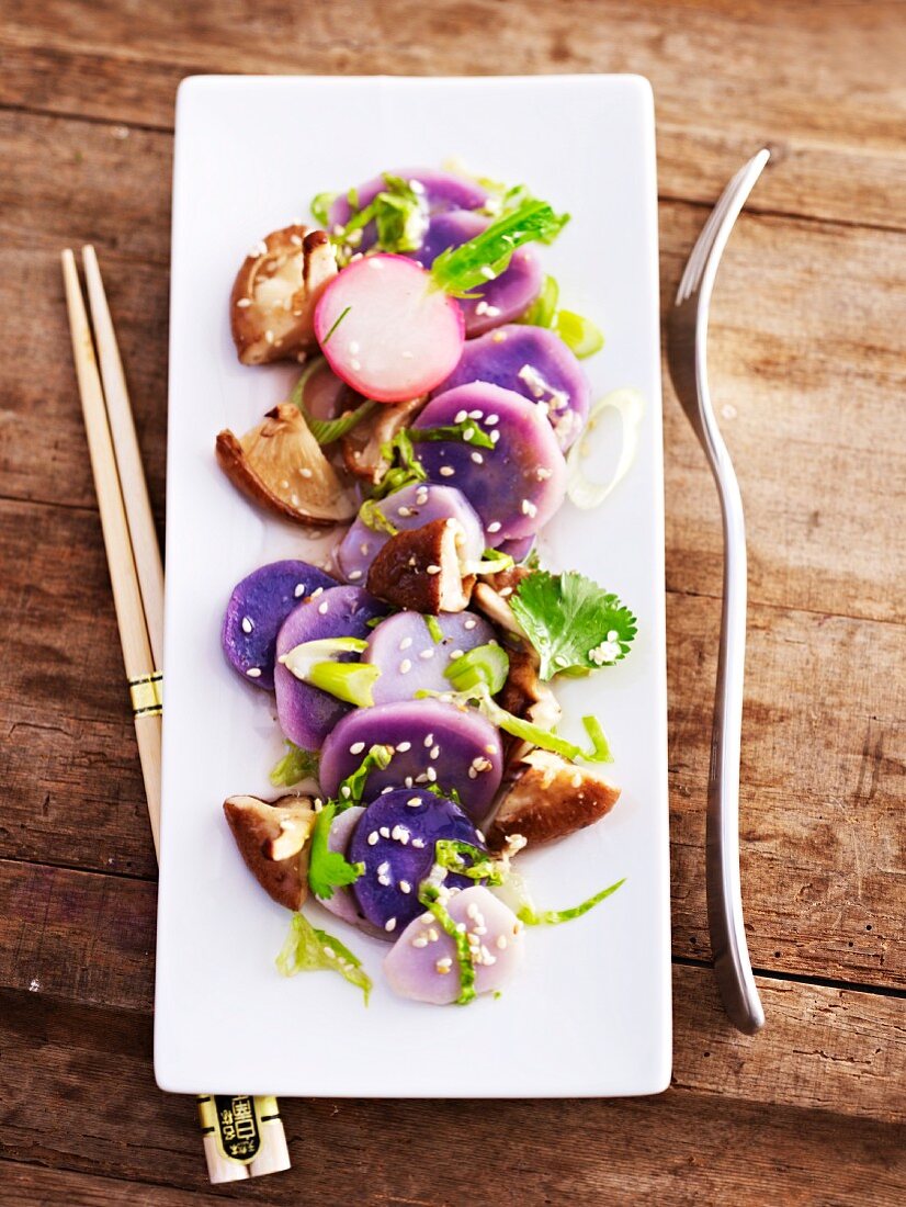 Oriental potato salad made with blue potatoes and shiitake mushrooms