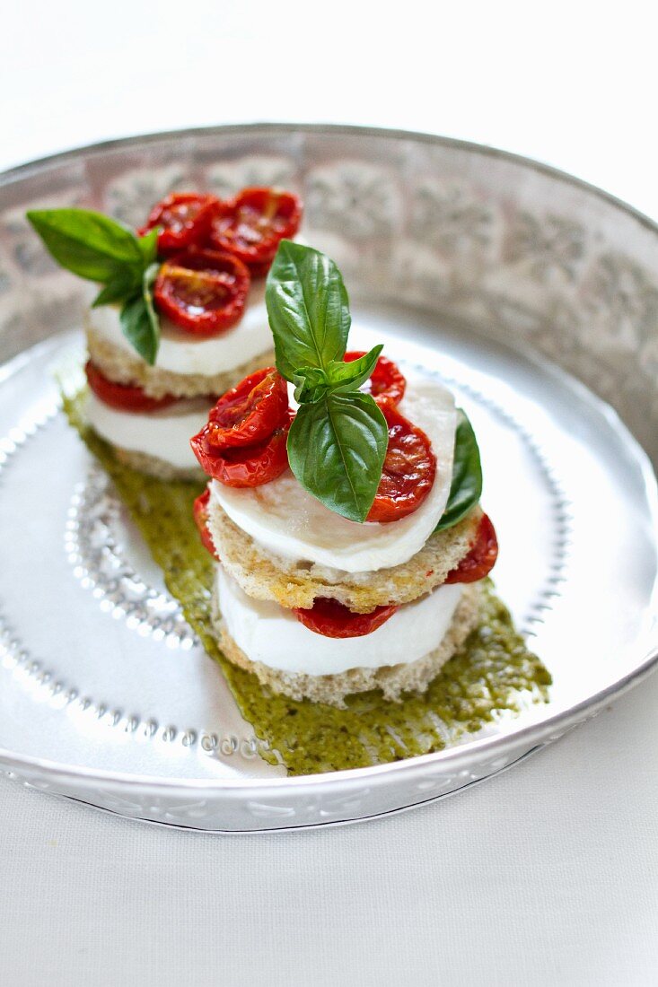 Bocconcini capresi (stacks of tomato and mozzarella, Italy)