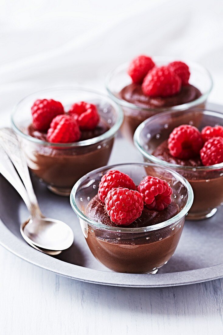 Chocolate mousse with brandy and raspberries