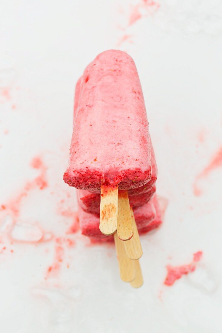 A stack of strawberry ice cream sticks