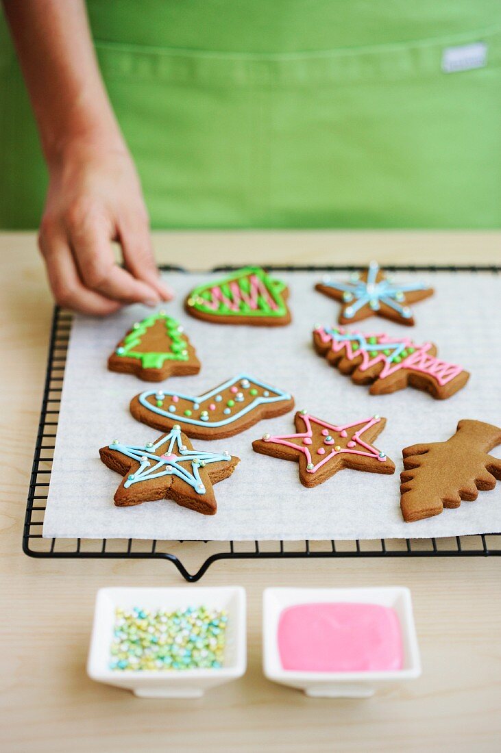 Christmas biscuits being decorated