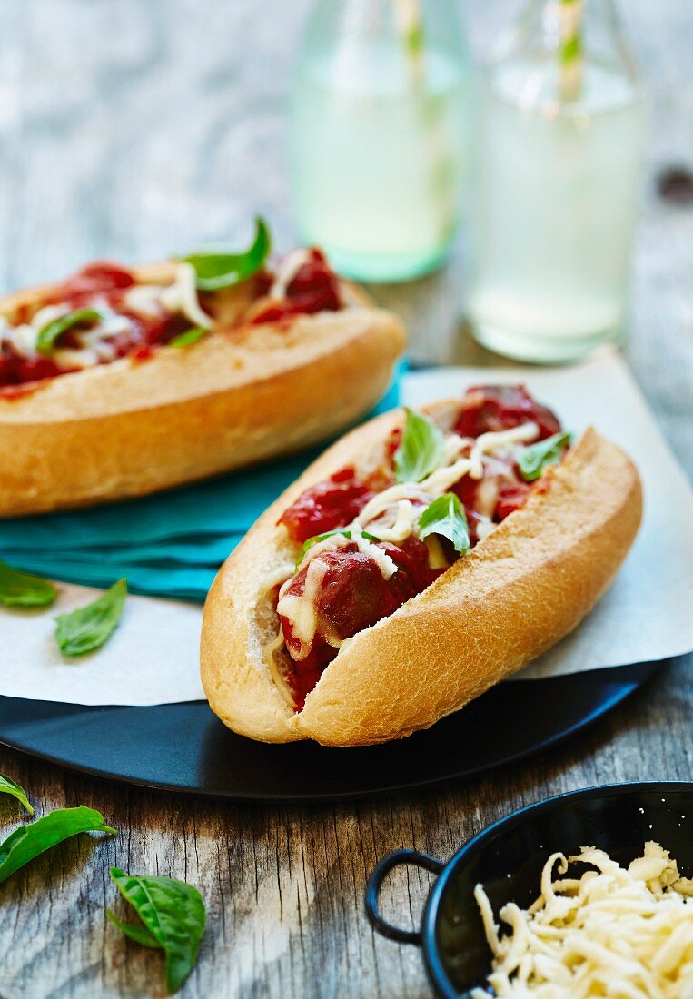 Baguette sandwiches with meatballs and cheese