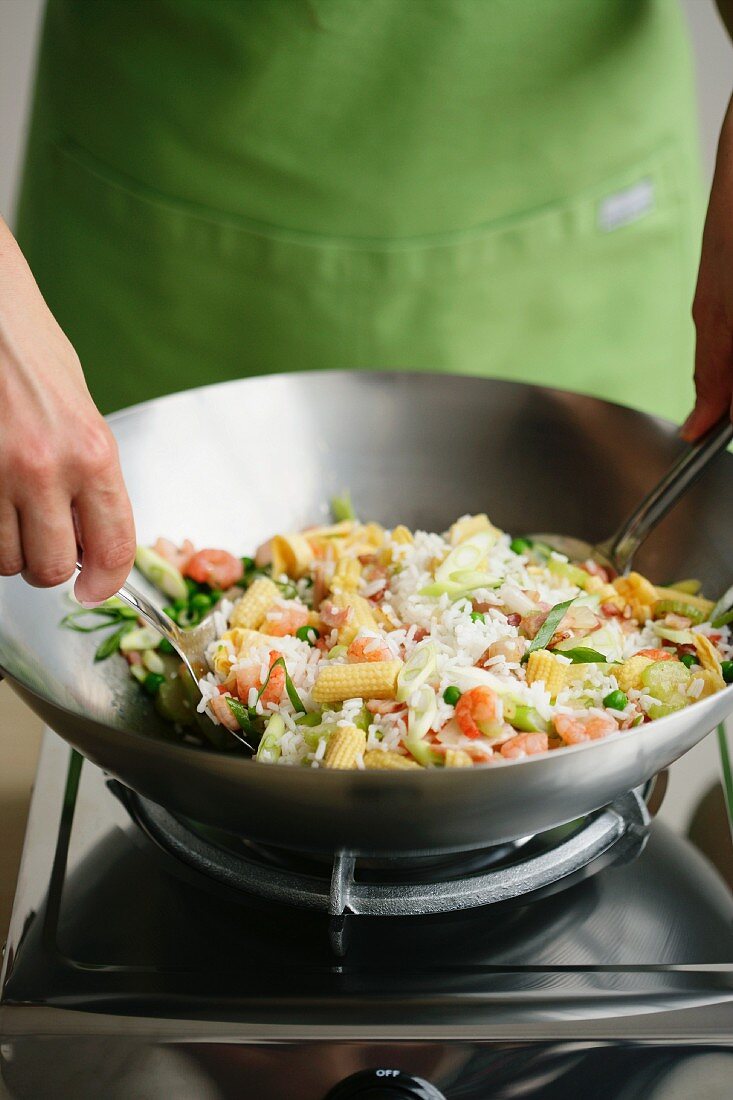 Fried rice being made in a wok