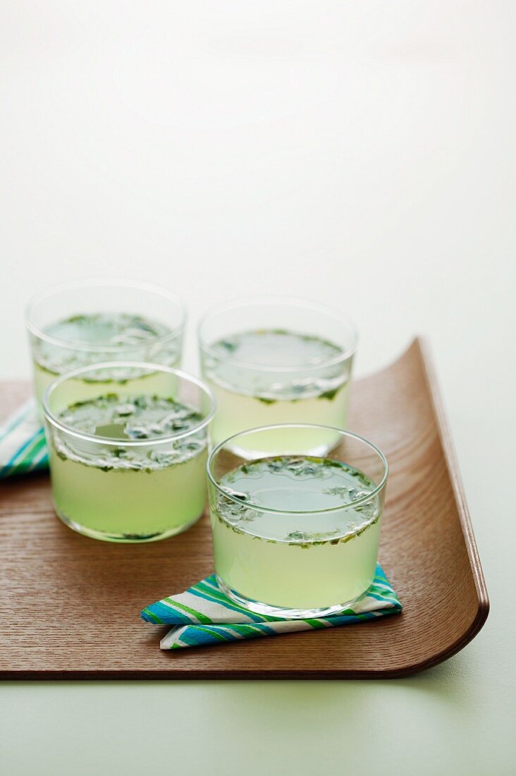 Lemonade cocktails with mint and basil