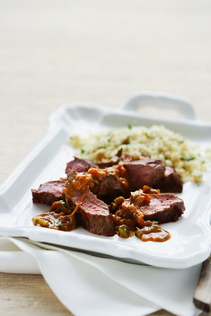 Spicy beef fillet with couscous (Morocco)