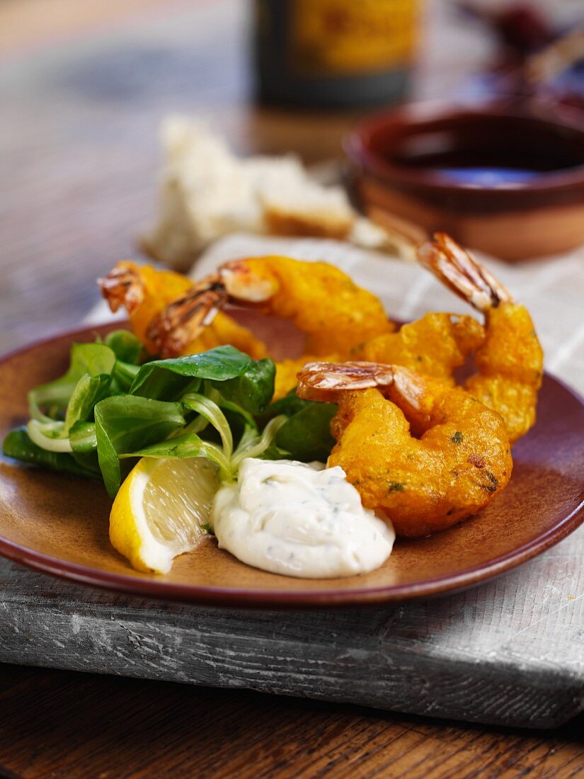 Battered king prawns with mayonnaise and lambs lettuce (Spain)