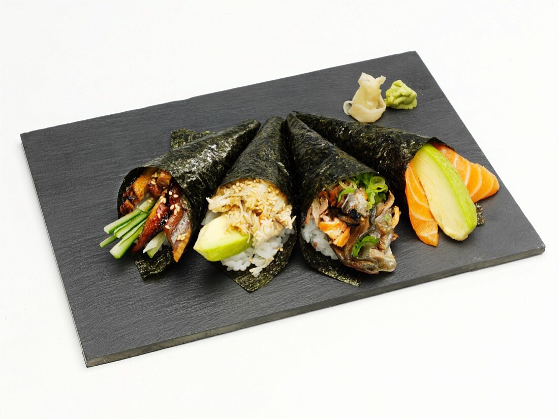 Various types of temaki on a grey platter