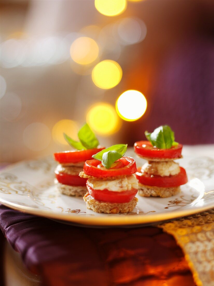 Tomato and mozzarella towers with basil