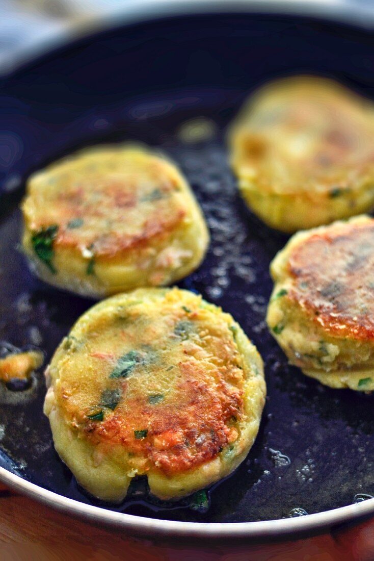 Salmon cakes in a pan