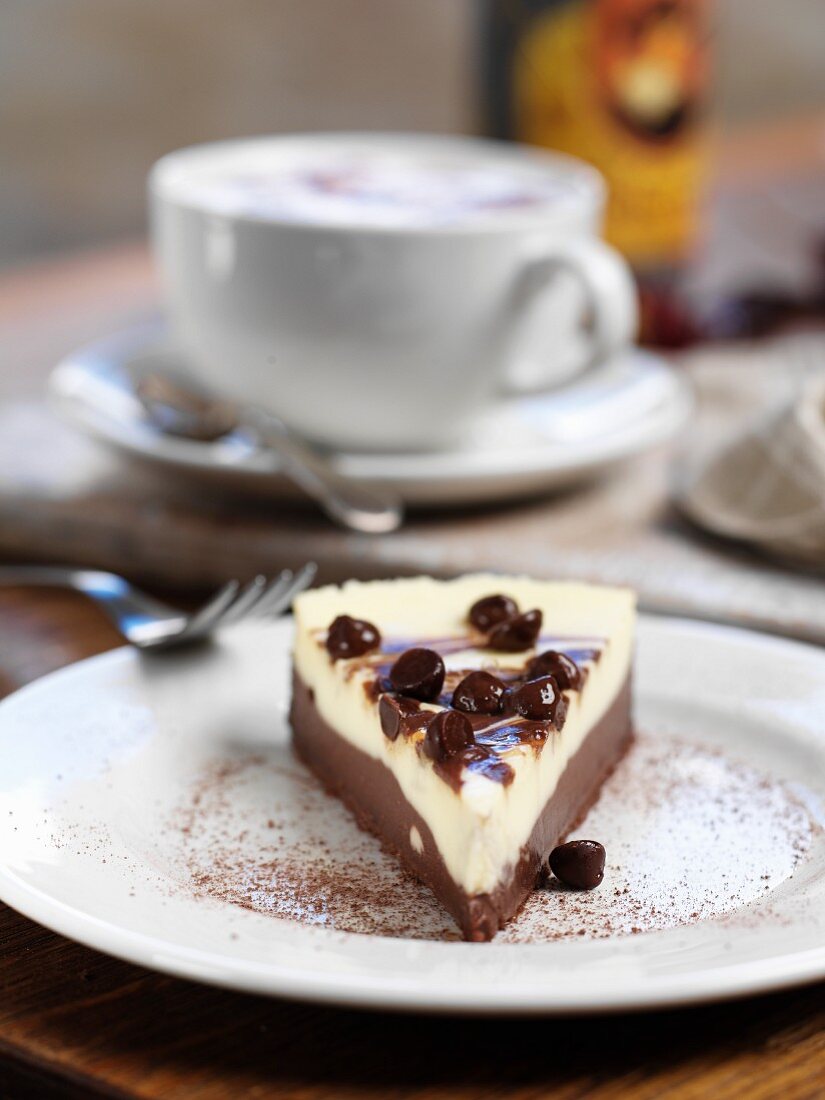 Chocolate cheesecake and a cup of coffee