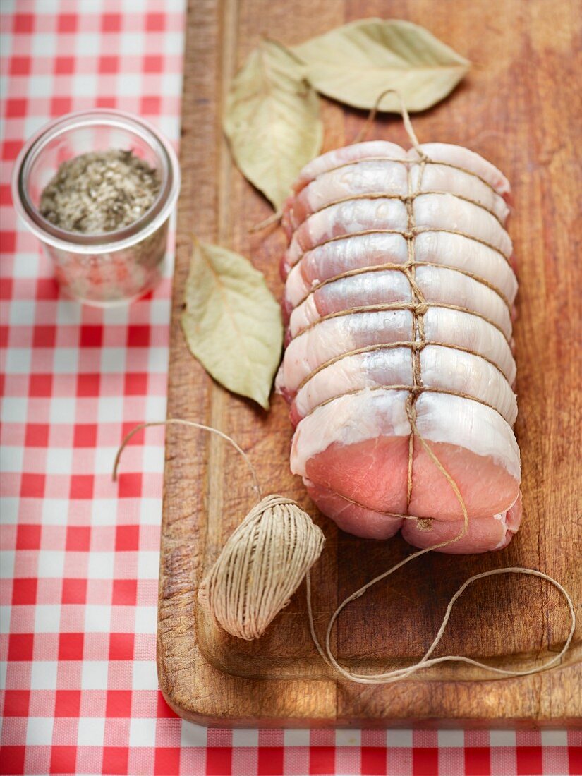 Prepared pork roulade tied with kitchen twine