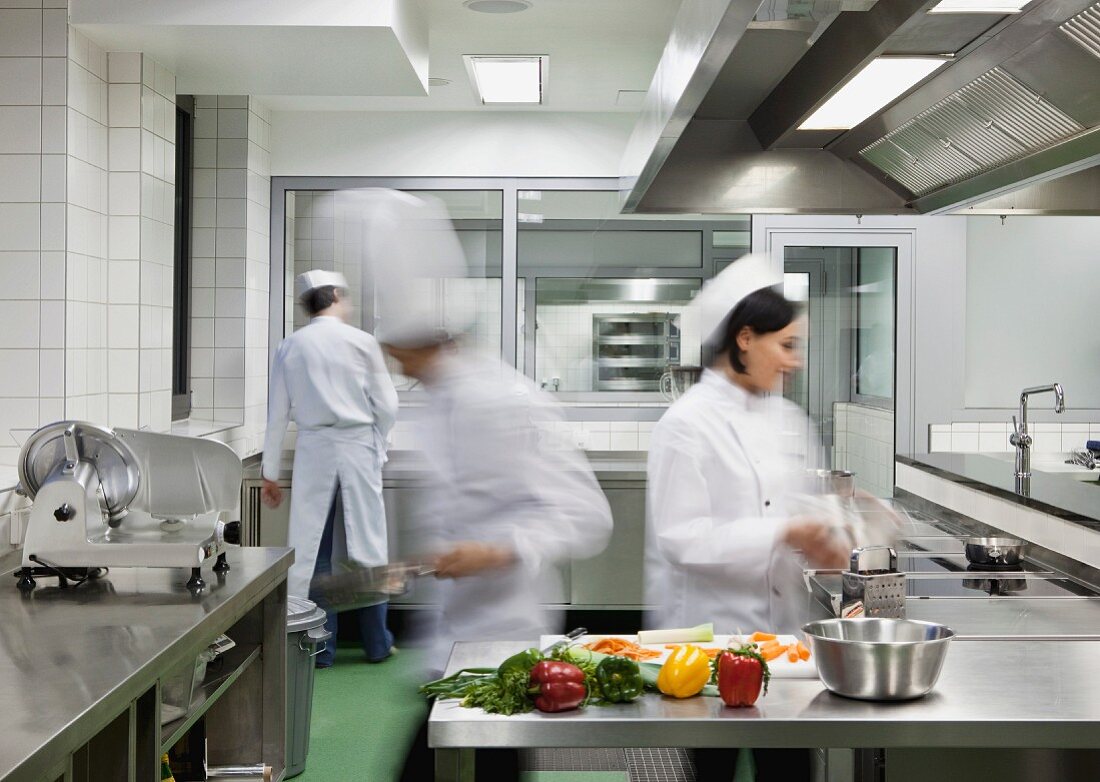 Chefs at work in a commercial kitchen