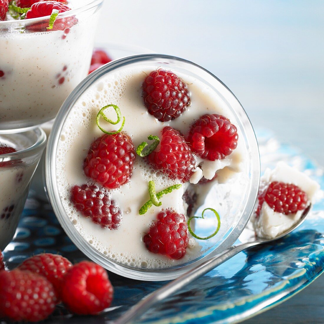 Coconut cream with raspberries (close-up)