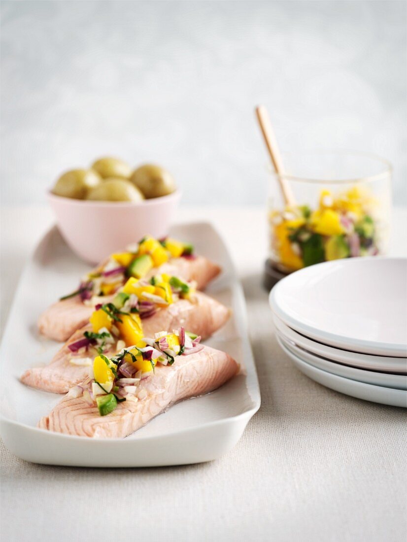 Poached salmon steaks with mango salsa