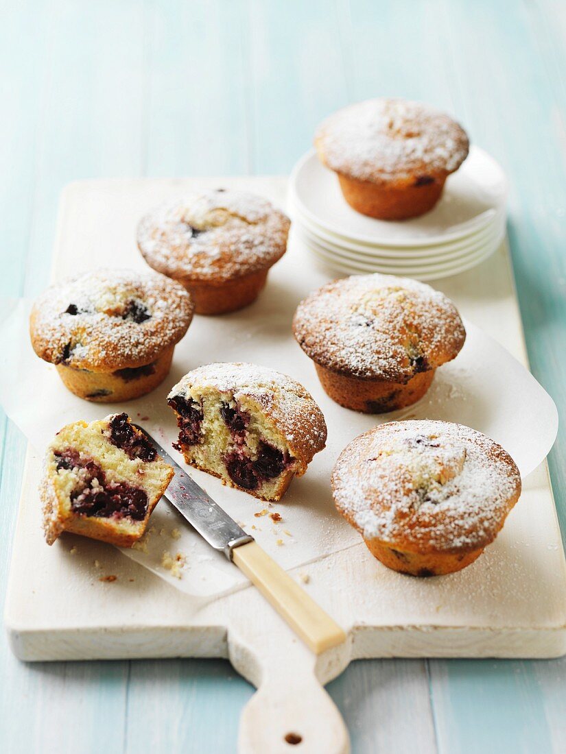 Cherry muffins with icing sugar