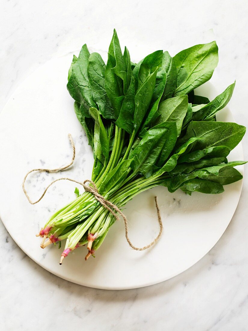 A bunch of spinach on a plate