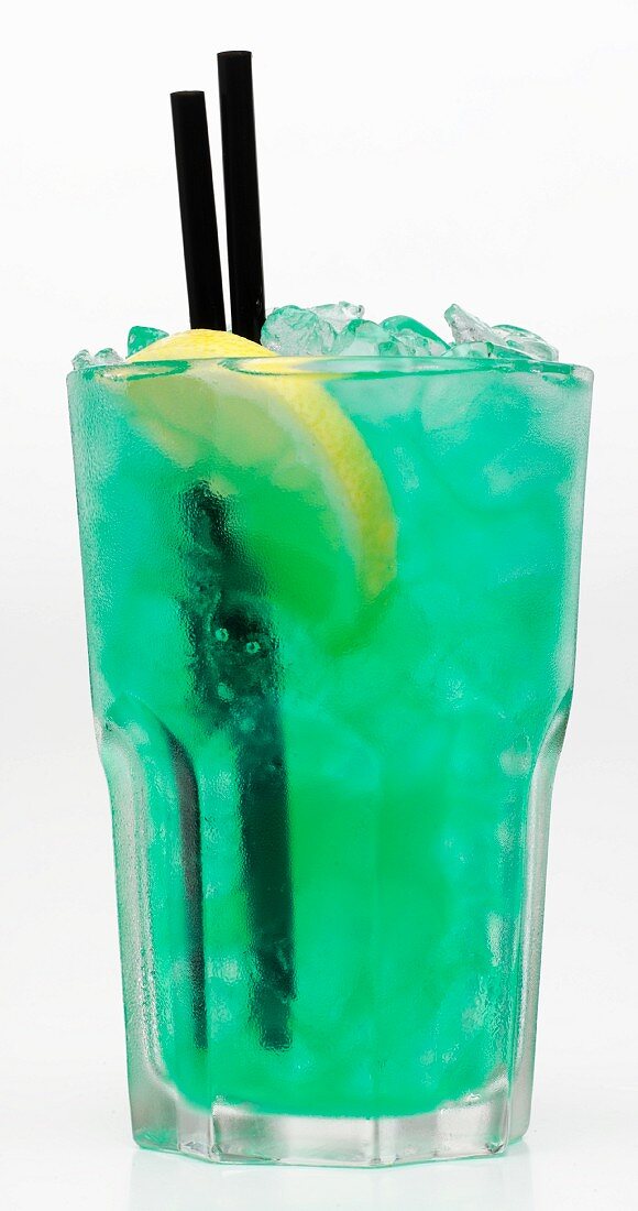 A turquoise cocktail with crushed ice against a white background