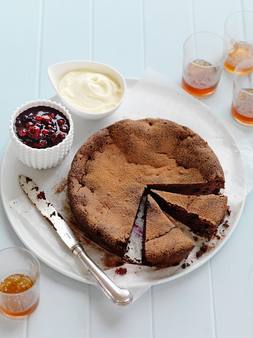 A chocolate and almond cake with blueberries