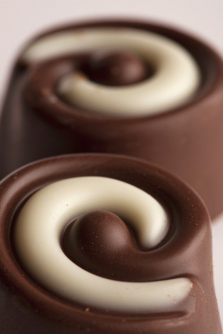 Two chocolate pralines