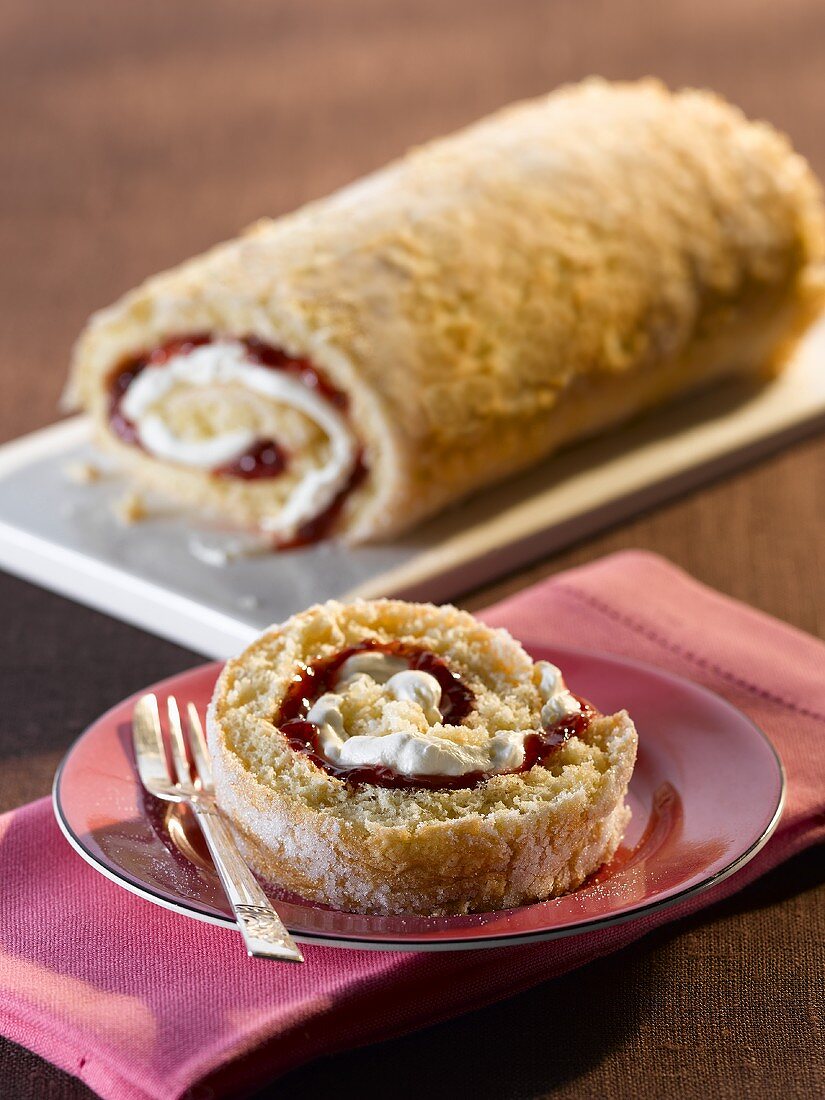 A Swiss roll filled with cream and jam
