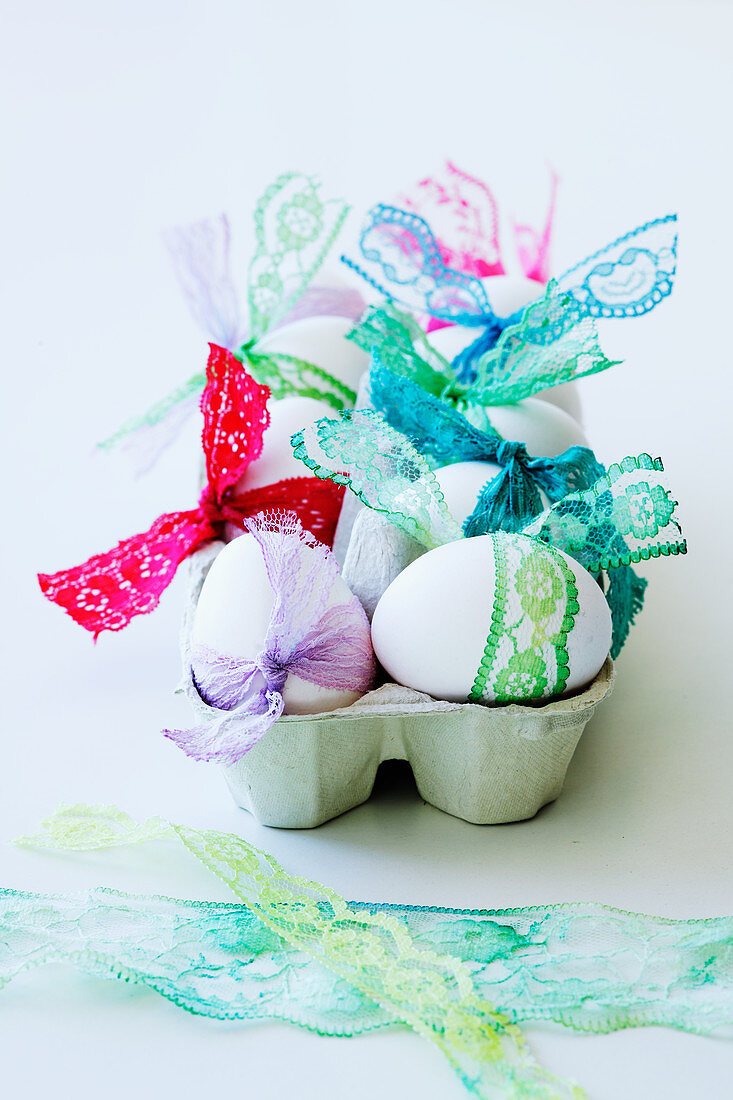 Eggs tied with colourful lace ribbons
