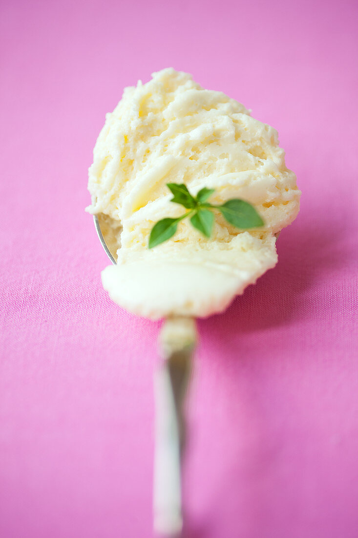 Orange and vanilla mascarpone cream on a spoon