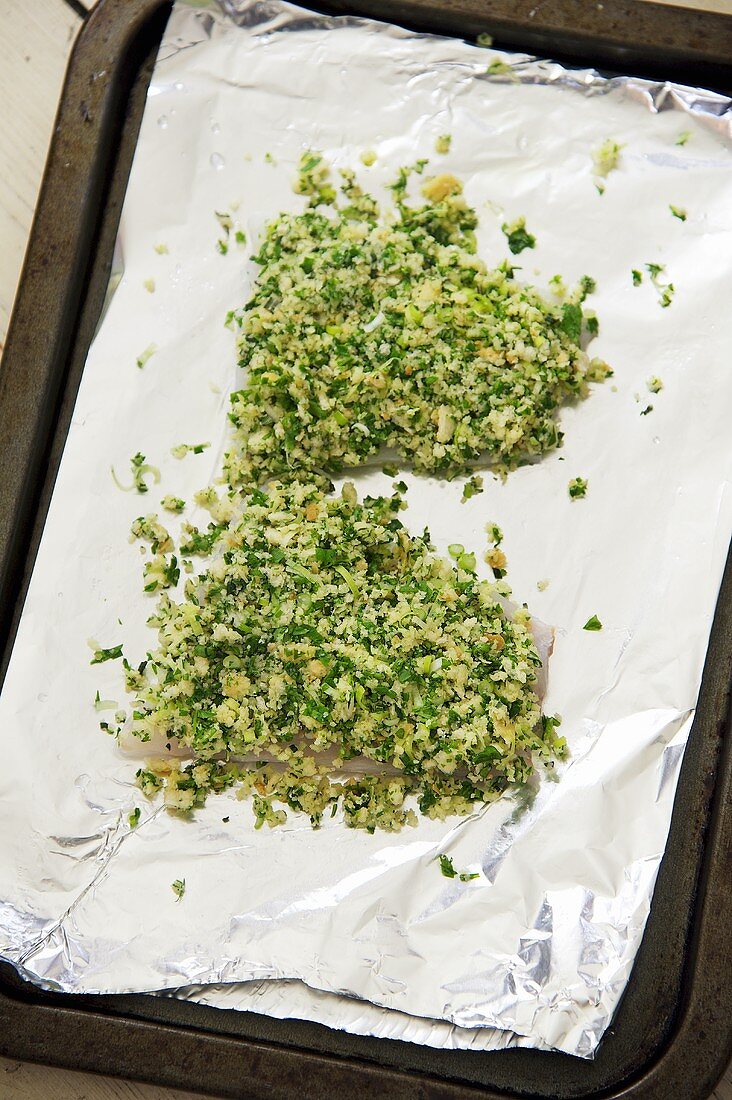 Cod with a horseradish and herb crust being prepared