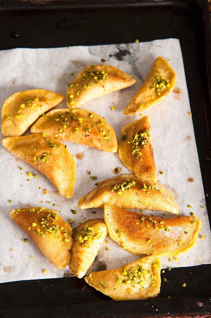 Quataif (stuffed pancakes, Arabia) with pistachios