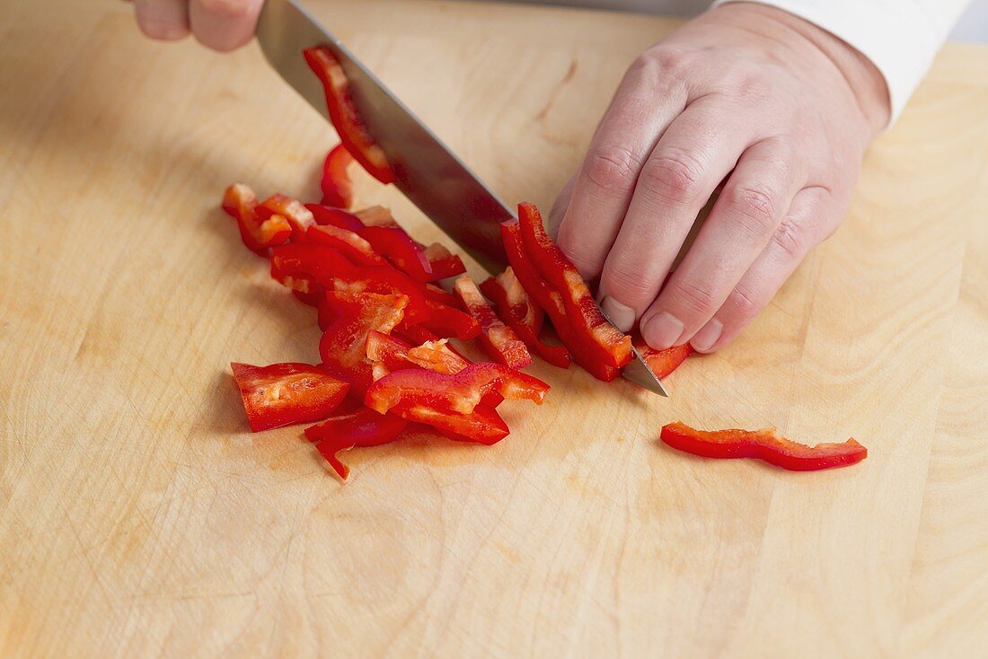 A pepper being sliced