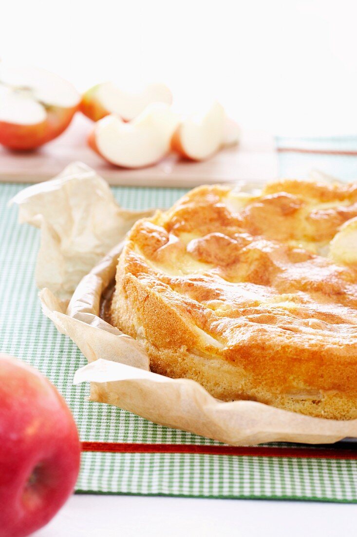 An apple cake on baking paper