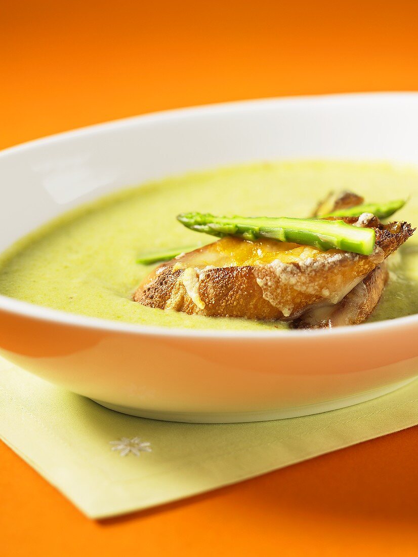 Cream of asparagus soup with cheese croutons
