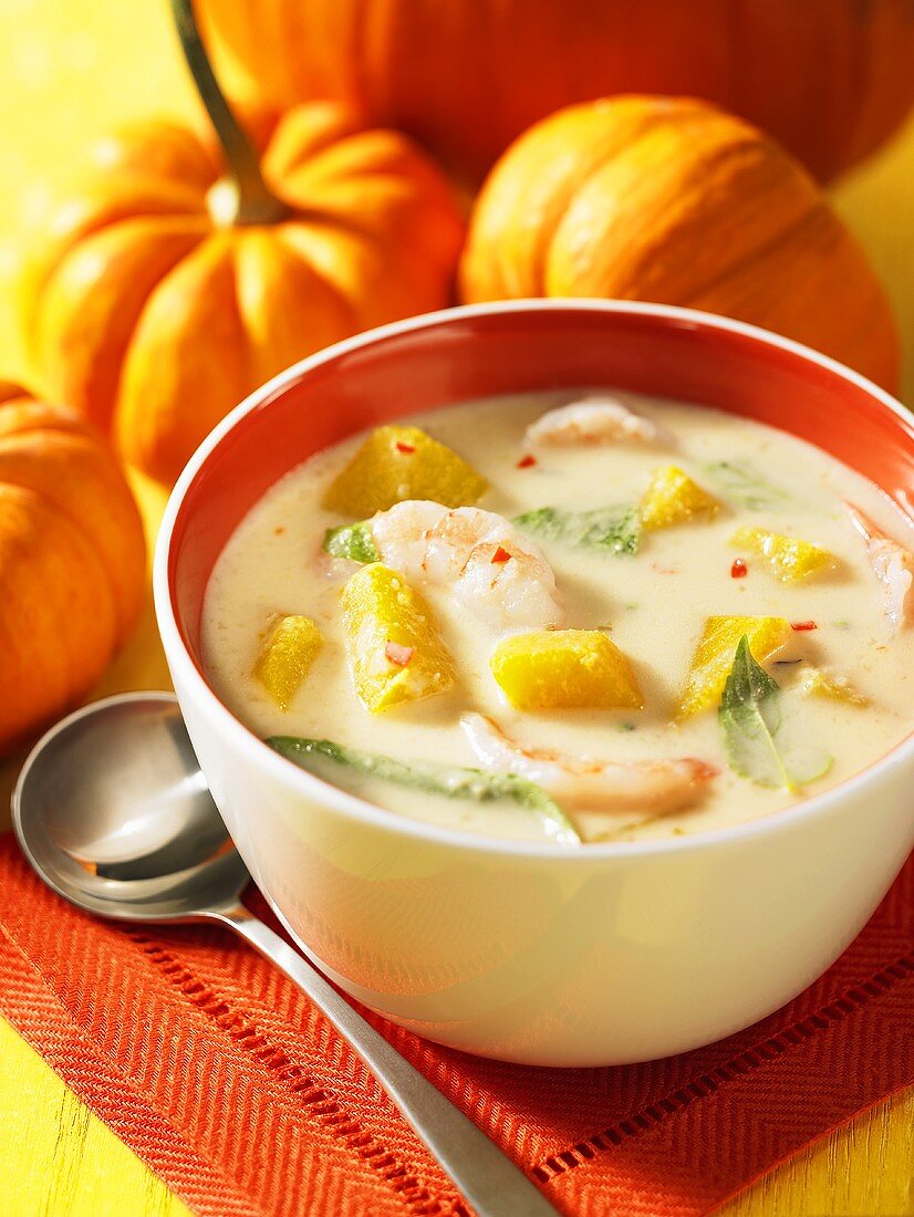 Coconut and pumpkin soup with prawns