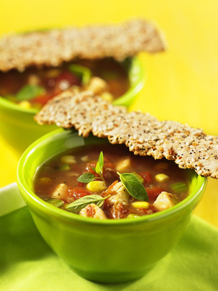 Vegetable soup with turkey and seeded crisp breads