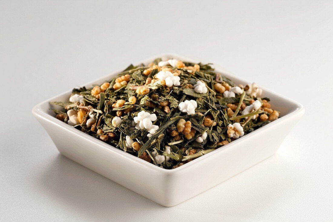 Japanese Gen Mai Cha Loose Green Tea in a White Dish; White Background