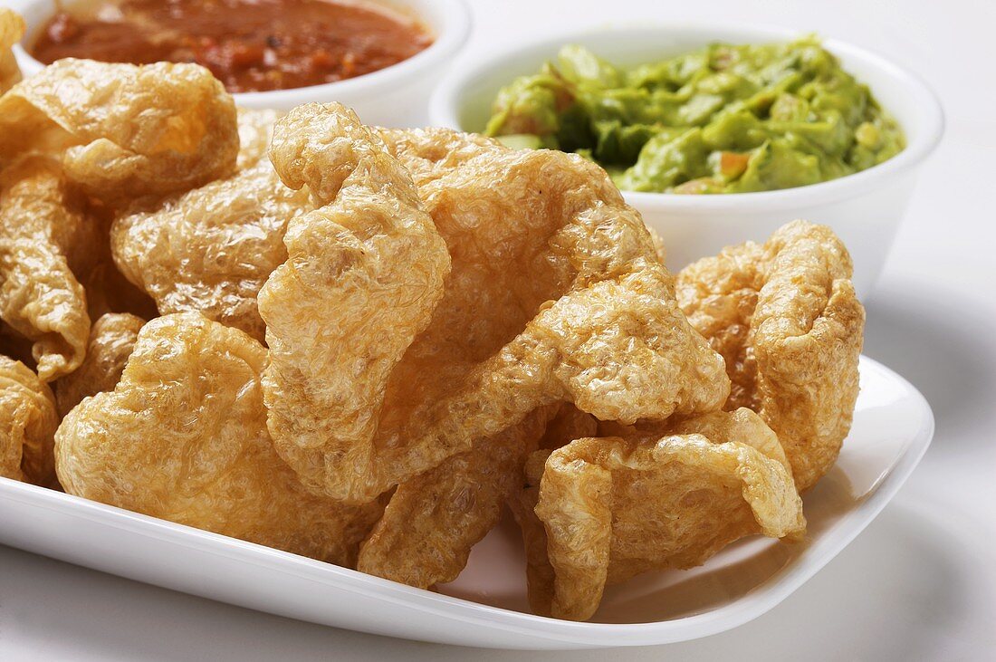 Pork Rinds with Guacamole and Salsa