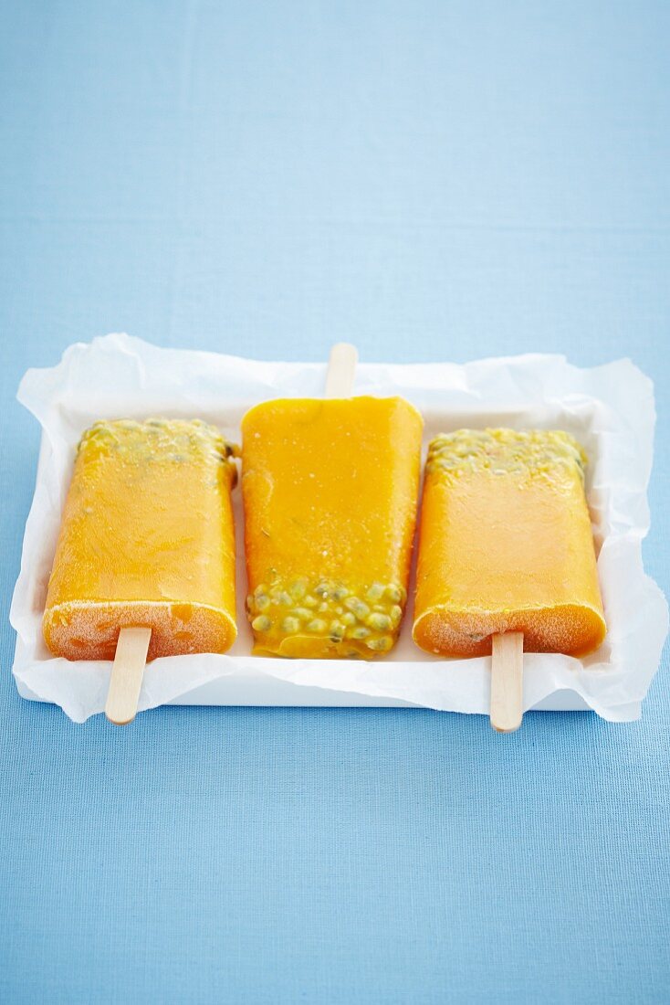 Mango and passion fruit ice lollies