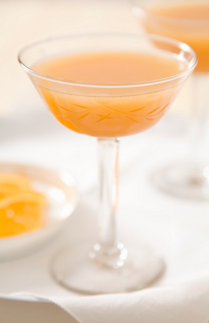 A cocktail made with apricot juice, vodka and Licor 43